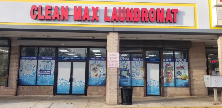 CleanMAX Laundromat storefront with window signs, promoting laundry services in Capitol Heights, MD